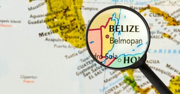 >Belize zet eerste...